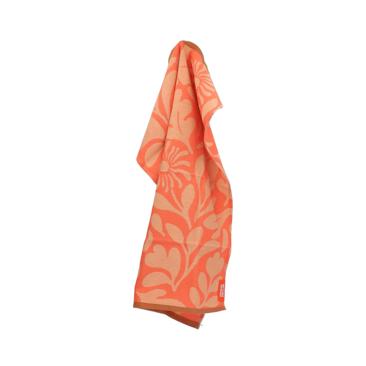 Hangende Carina theedoek in koraal met bloemendessin