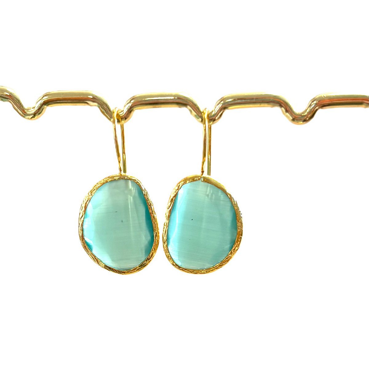 Oorbellen cateye steen licht blauw