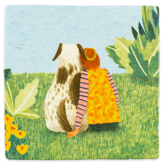 StoryTiles Companions: meisje en gevlekte hond in een veld