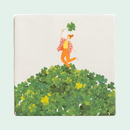 StoryTiles Vind je geluk – keramische tegel 10x10 cm op pastelachtergrond
